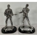 A pair of Silver Dreams by Leonardo (2005/6) statuettes of Cliff Richard and Hank Marvin in