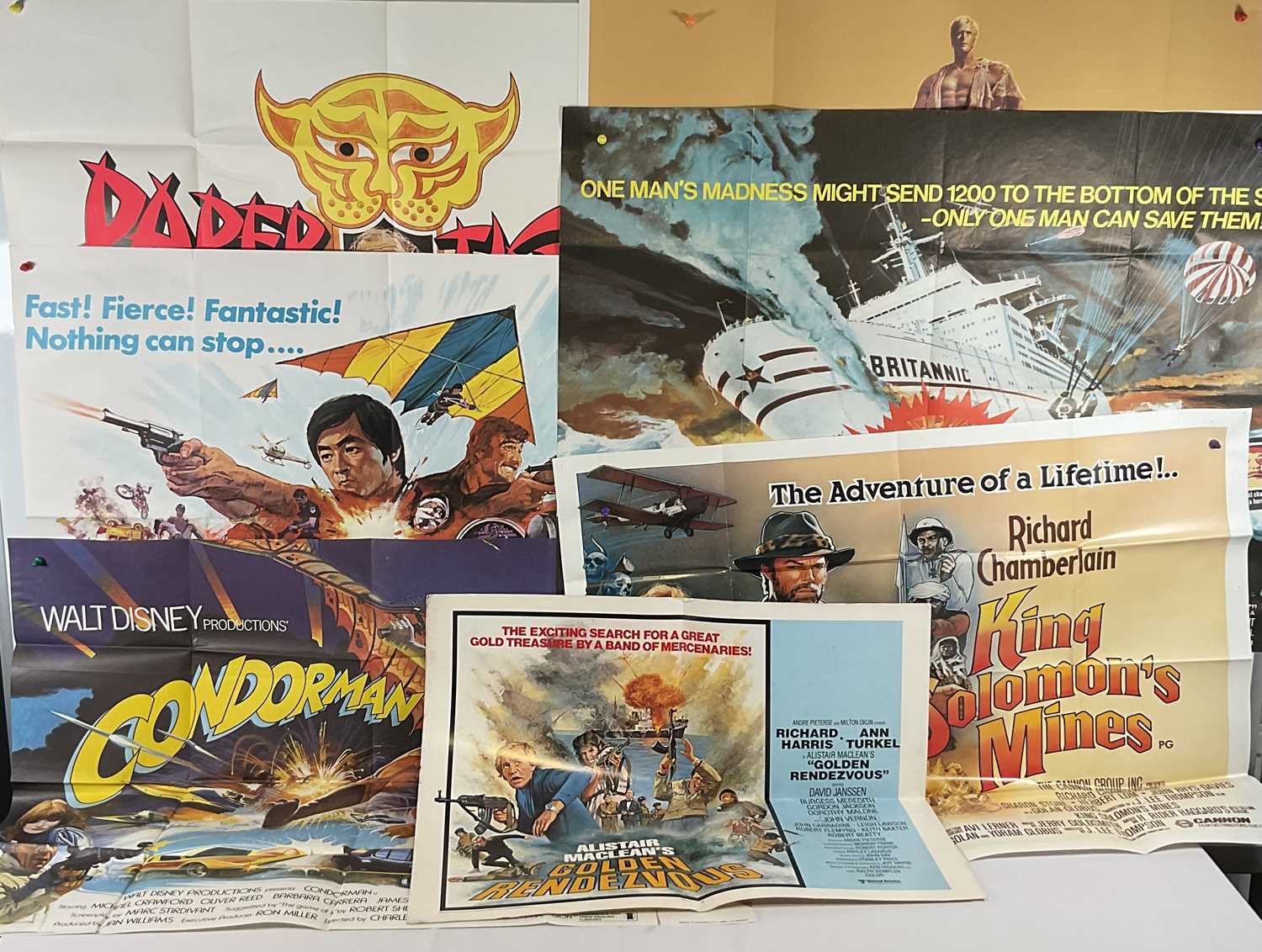 A group of Action / Adventure movie posters comprising GOLDEN RENDEZVOUS (1977) US half sheet,