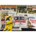 A group of Westerns movie posters comprising of SHANE (1953) US half-sheet 1966 re-release,