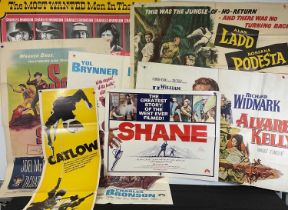 A group of Westerns movie posters comprising of SHANE (1953) US half-sheet 1966 re-release,