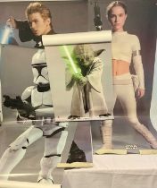 A group of life-size Star Wars character posters from the release of STAR WARS EPISODE II: ATTACK OF
