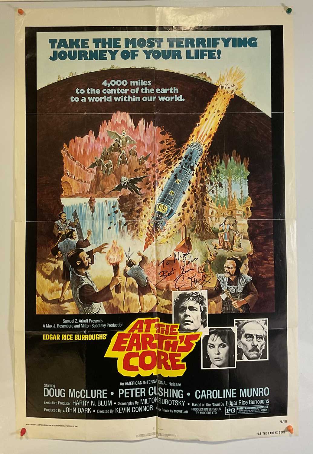 AT THE EARTHS CORE (1976) US one sheet film poster, signed by actress Caroline Munro, artwork by