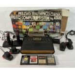 RETRO GAMING - An Atari CX-2600 video computer system, complete in original box with 4 paddle
