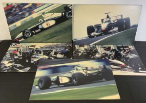 A group of 5 photographic prints of McLaren F1 racing scenes, mounted on ebonised wood, each with '