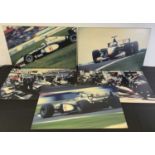 A group of 5 photographic prints of McLaren F1 racing scenes, mounted on ebonised wood, each with '