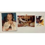 A group of 3 James Bond related autographed photographs comprising of JUDI DENCH, SHIRLY EATON and