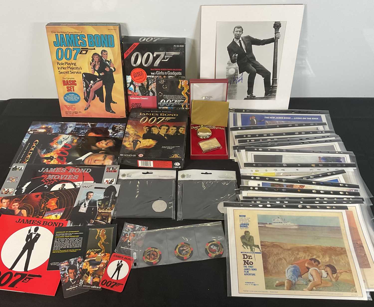 A collection of JAMES BOND collectibles and memorabilia to include 17 facsimile lobby card sets,