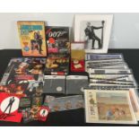 A collection of JAMES BOND collectibles and memorabilia to include 17 facsimile lobby card sets,