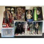 A group of collectible Star Wars action figures including Hasbro 1998 Primcess Leia and R2-D2,