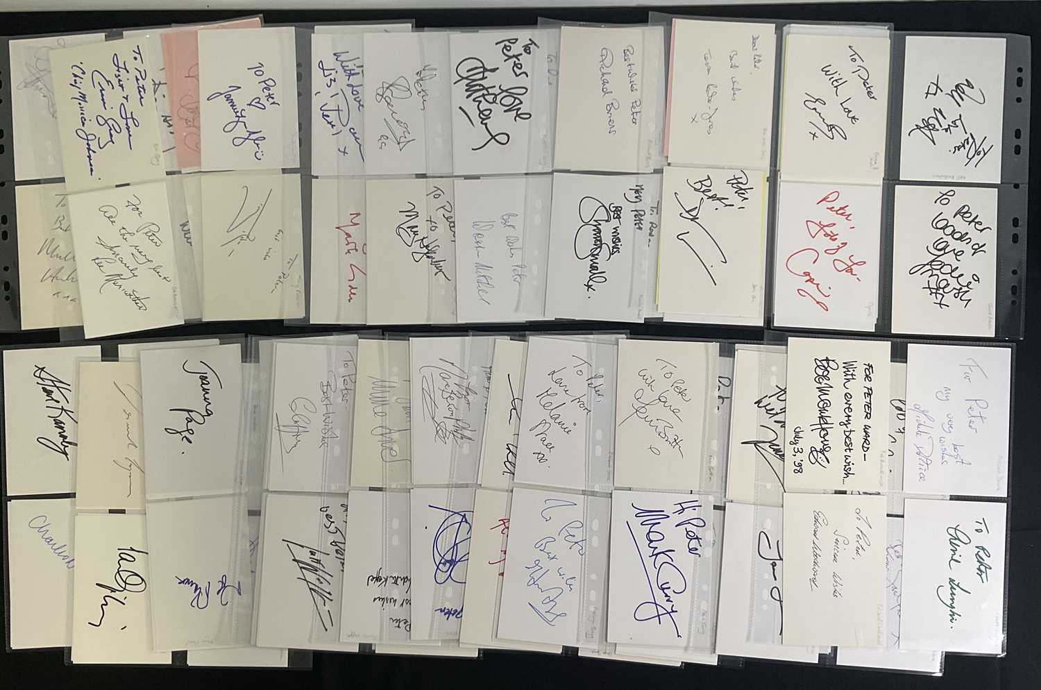 A large quantity of signed autograph cards by various, mostly British celebrities including JOHN