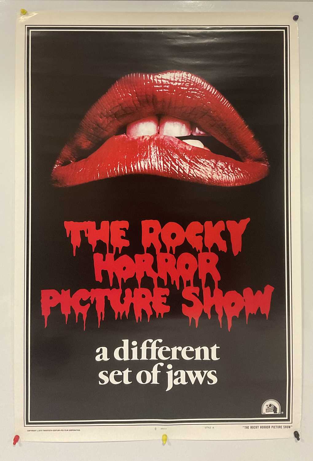 A one-sheet commercial poster for THE ROCKY HORROR PICTURE SHOW (1975), rolled.