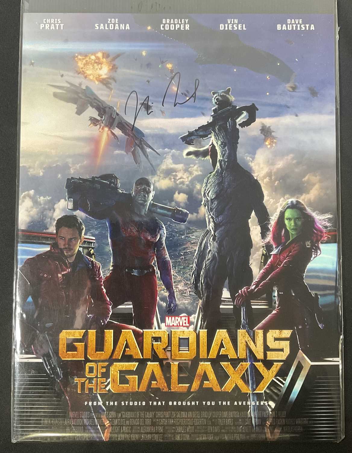 A mini poster for Guardians of the Galaxy signed by VIN DIESEL who voices Groot in the movies.