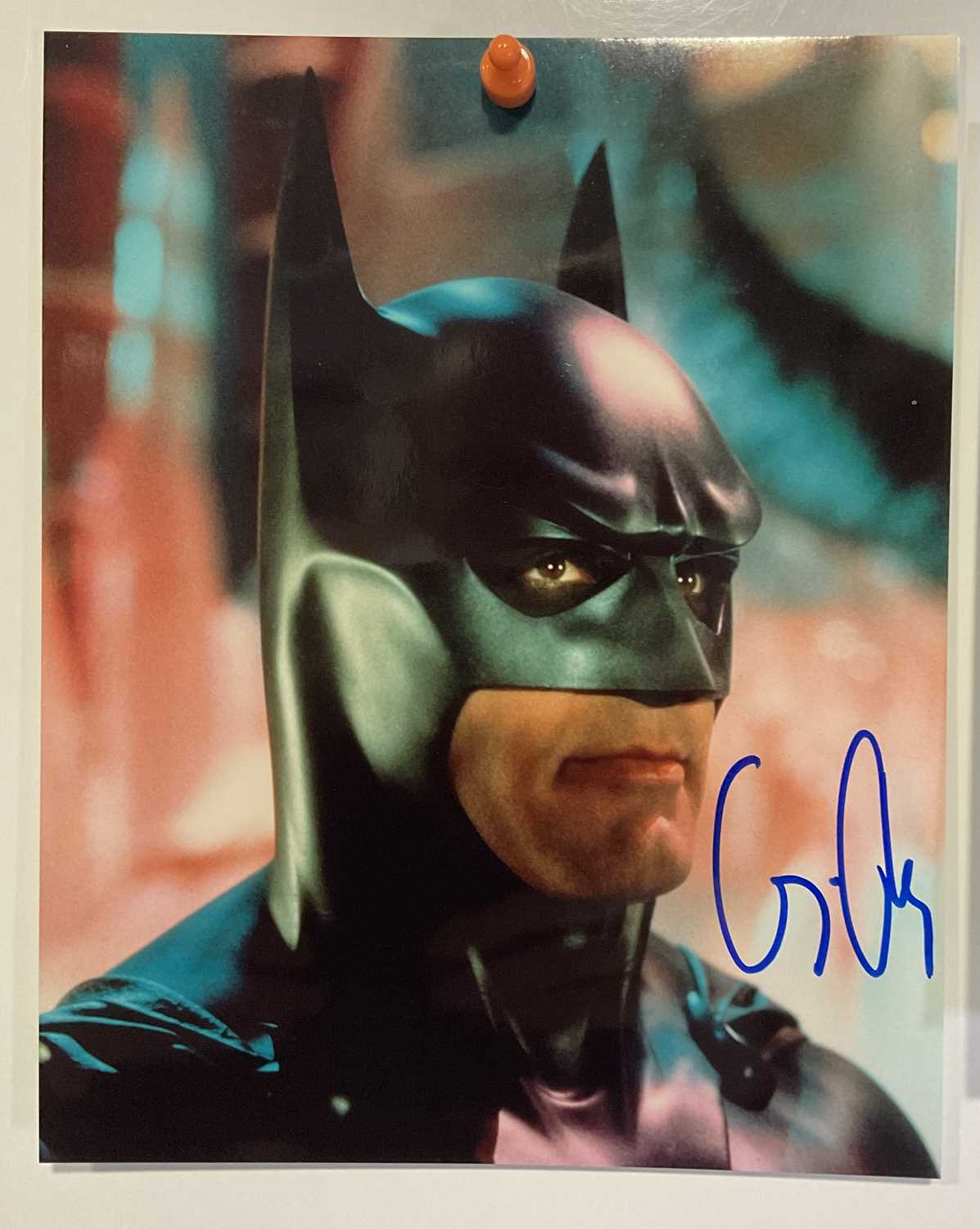 Two signed photographic stills of GEORGE CLOONEY (One as Batman) signed in blue pen, one - Image 2 of 3