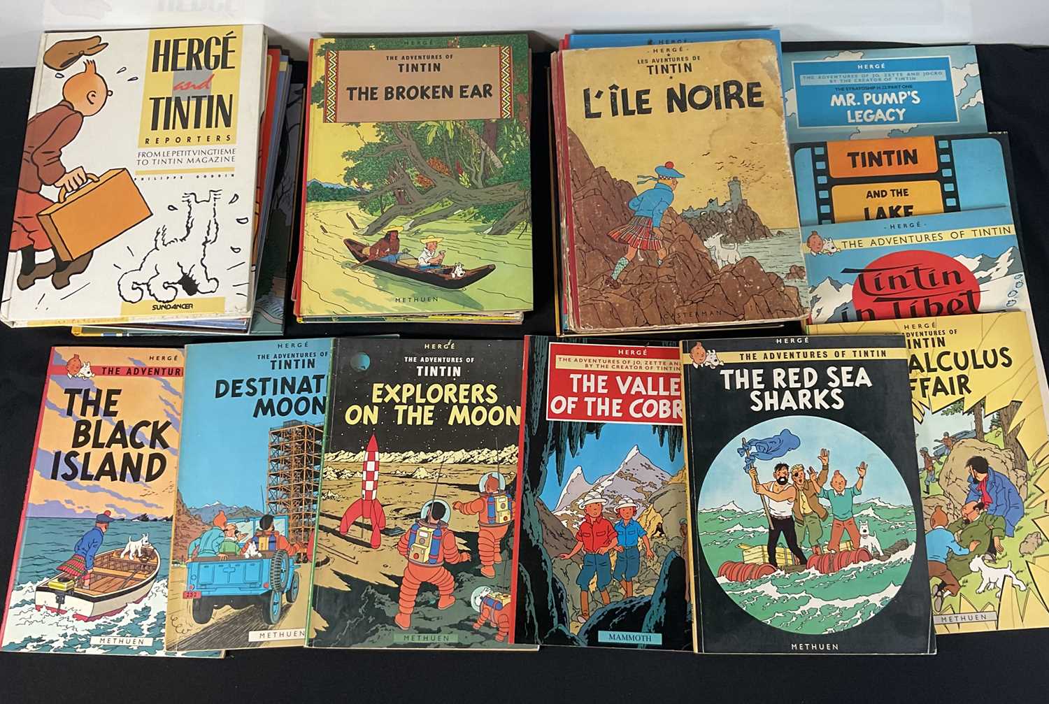A quantity of TINTIN hardback and paperback books by Hergé, mostly 1970s editions, various