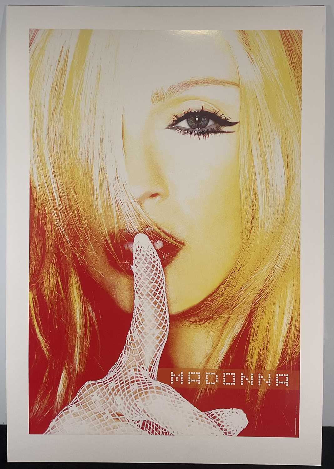 A 2001 MADONNA commercial poster mounted on board, 69cm x 99cm with mount.