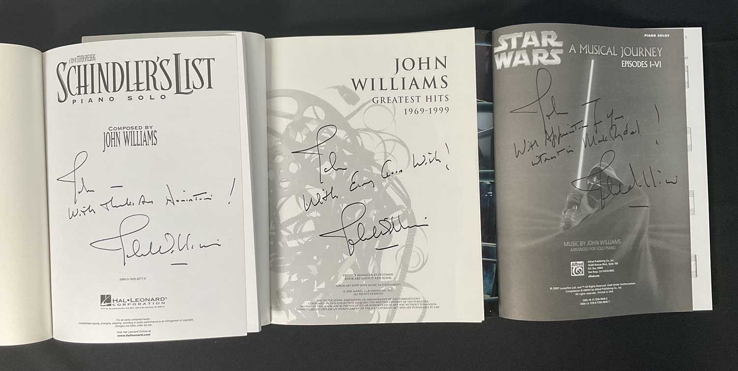 A group of three JOHN WILLIAMS signed sheet music books - STAR WARS A MUSICAL JOURNEY EPISODES I-VI,