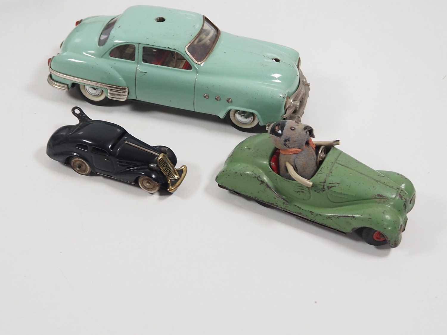 A group of SCHUCO vintage tinplate vehicles comprising a boxed submarine and three cars - F/G in F/G - Image 3 of 6