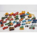 A group of mainly DINKY diecast lorries, cranes and other accessories all playworn examples - F/G (