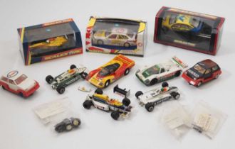 A group of mostly vintage SCALEXTRIC slot cars and accessories - F/VG in G boxes where boxed (10