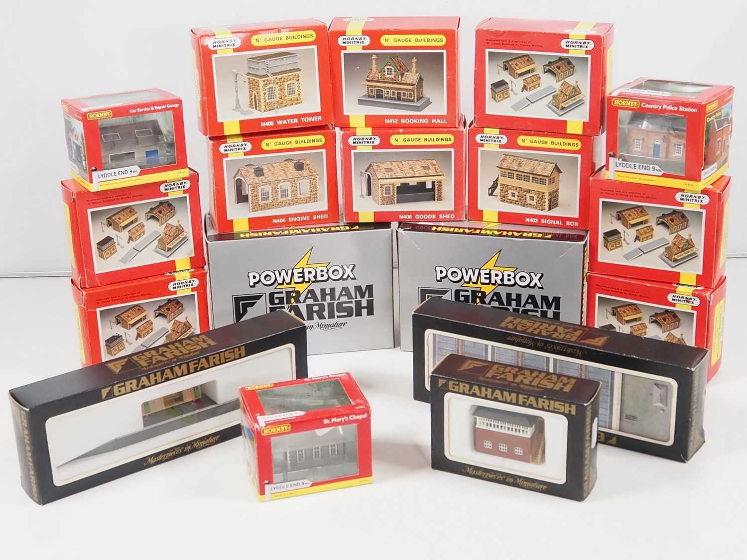 A group of HORNBY MINITRIX and LYDDLE END buildings in plastic and resin in original boxes