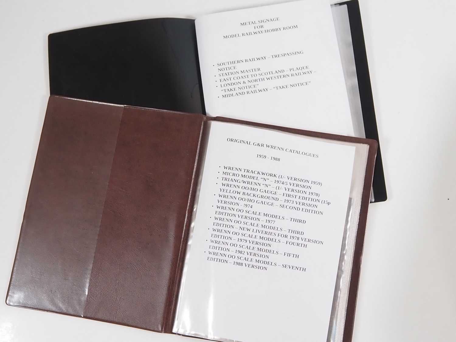 A pair of binders, the first containing WRENN catalogues from 1959 - 1988 and the second with a