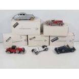 A group of 1:24 scale DANBURY MINT diecast cars to include a Pierce Silver Arrow and a Hispano-Suiza