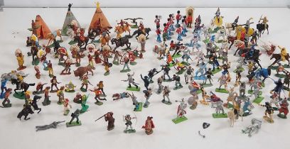 A large quantity of plastic and diecast cowboys, Indians and various types of soldier by TIMPO,