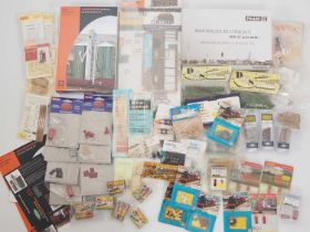 A quantity of OO gauge kits and accessories by various manufacturers, mostly in original packets -