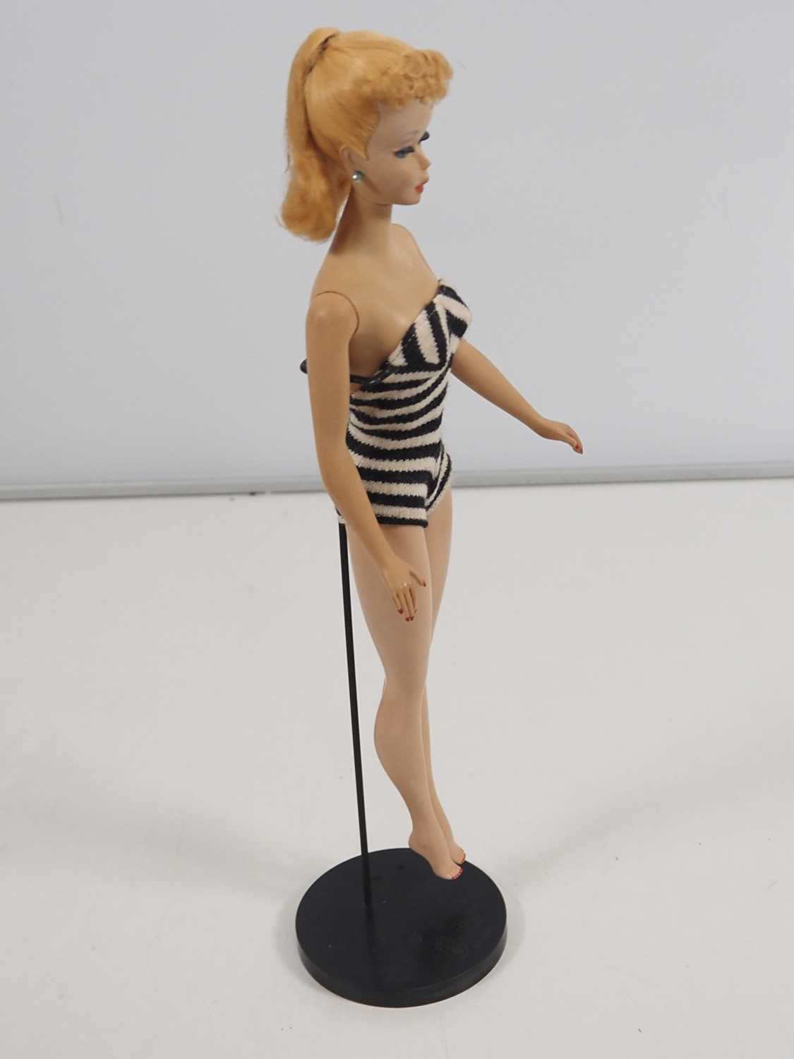 An original vintage MATTEL BARBIE doll, circa 1959/60, complete with swimsuit, mule shoes, - Image 3 of 9
