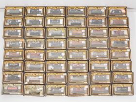 A large group of MAINLINE boxed OO gauge wagons of various types - VG in G/VG boxes (48)