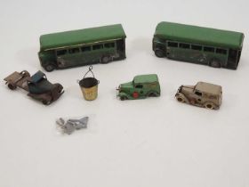 A group of vintage TRIANG MINIC clockwork vehicles comprising 2 x delivery vans, a truck (A/F), 2