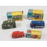 A group of CORGI diecast vehicles comprising a 225 Austin Seven, a 359 Army Field Kitchen and a