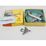 A pair of DINKY diecast aircraft comprising a 998 Bristol Britannia in Canadian Pacific livery in