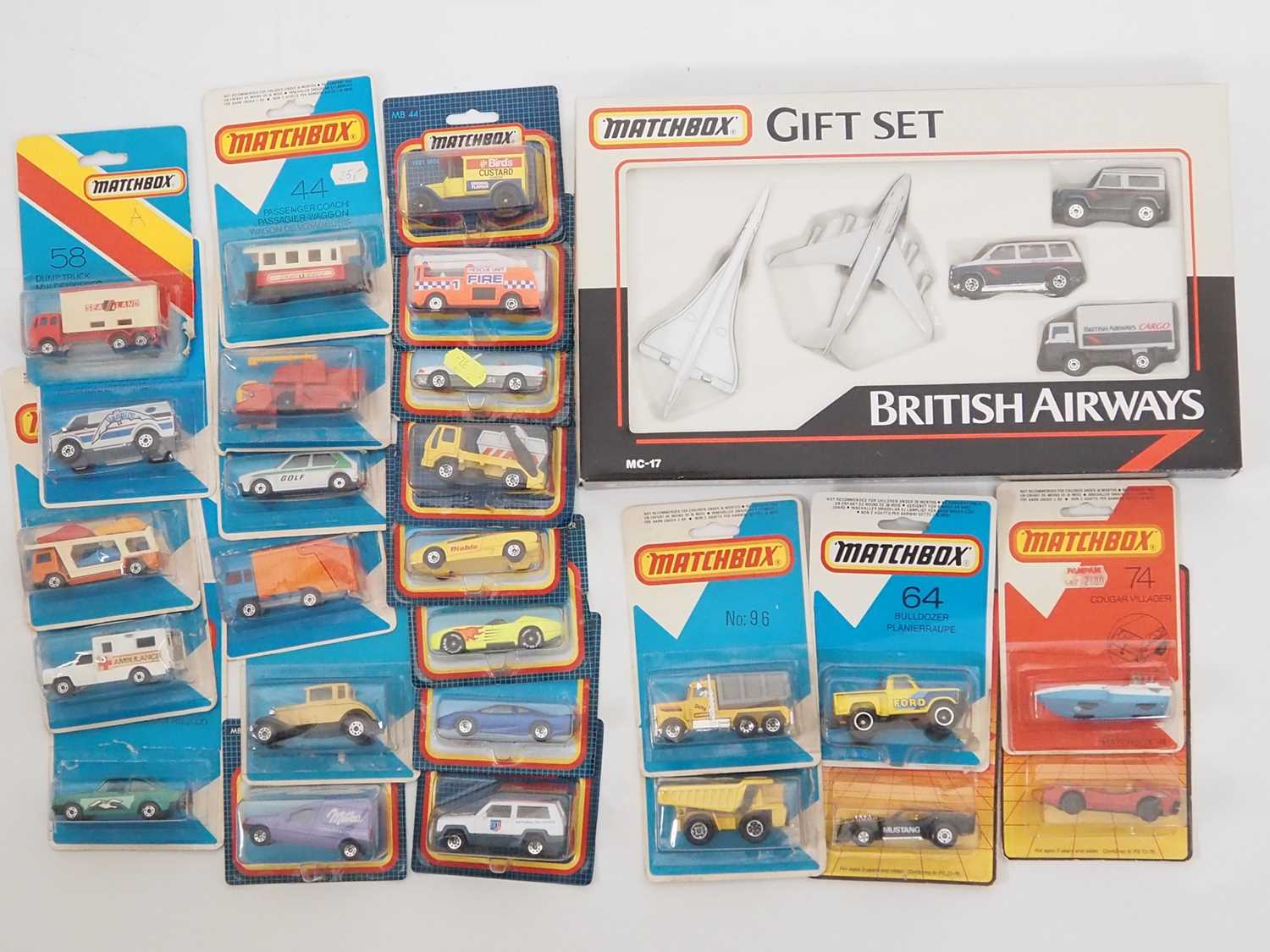A group of MATCHBOX diecast vehicles on original cards - mostly sealed, together with a MATCHBOX