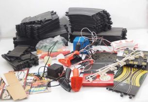 A large quantity of vintage SCALEXTRIC track and accessories - F/G unboxed (Q)