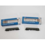 A pair of DAPOL N gauge class 121 single car railcars (one motorised, one dummy) both in BR green