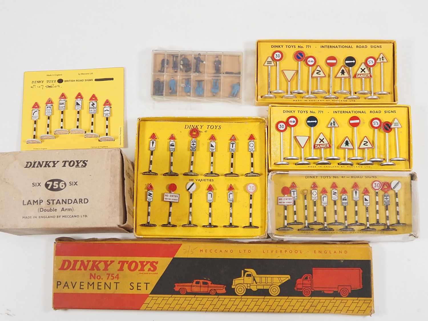 A group of DINKY original accessories kits comprising various signs sets, a figure set, a