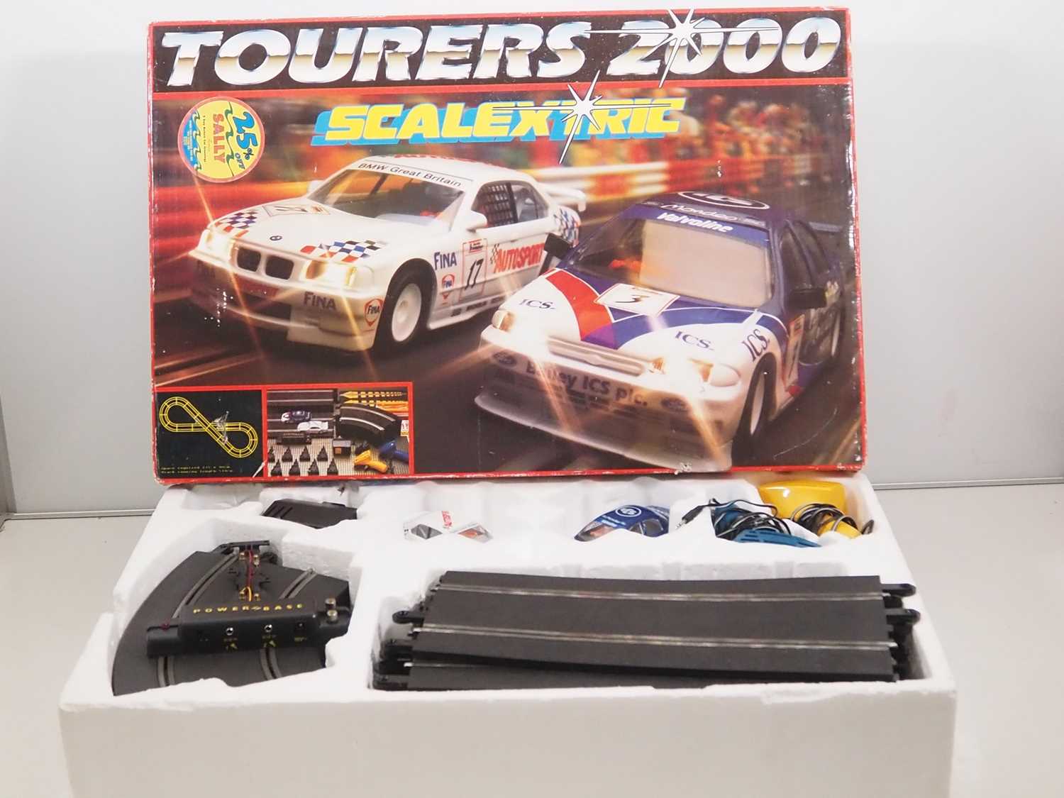 A SCALEXTRIC 'Tourers 2000' slot racing set, appears complete - VG in G box