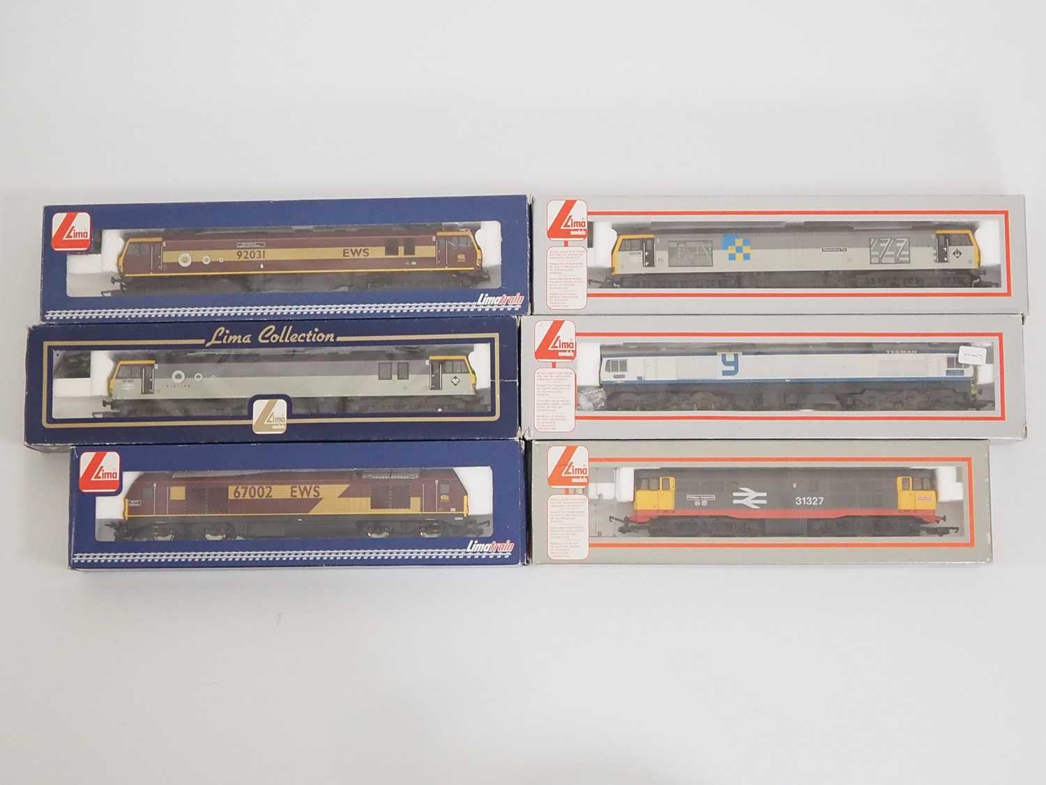 A group of LIMA OO gauge diesel and electric locomotives comprising examples of classes 31, 59,