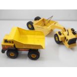A pair of vintage TONKA pressed steel toys comprising a dump truck and a road scraper - G unboxed (