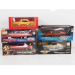 A group of 1:18 scale diecast cars by AUTOART and others including movie and TV related examples -