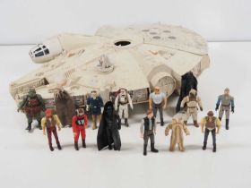 A group of vintage PALITOY/KENNER Star Wars toys comprising a Millennium Falcon and various