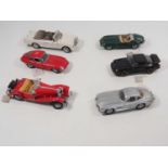 A group of 1:24 scale FRANKLIN MINT diecast cars to include a Gullwing Mercedes and a Porsche