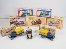 A group of KOVAP tinplate Czech produced replica tinplate trucks (one unboxed) together with some