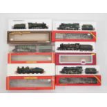 A group of OO gauge steam locomotives by HORNBY, MAINLINE and DAPOL in GWR, SR and LNER liveries -