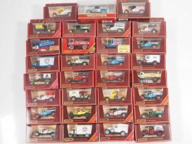 A group of diecast MATCHBOX MODELS OF YESTERYEAR vans in maroon coloured boxes - all Code 2