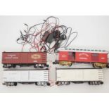 An unusual group of G scale American outline freight cars and combine cars all fitted with