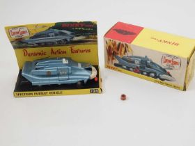 A DINKY 104 diecast 'Gerry Anderson's Captain Scarlet' Spectrum Pursuit Vehicle in original box with