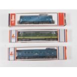 A group of LIMA N gauge diesel locomotives comprising Deltics in BR blue and green and a class 31 in