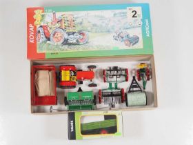 A KOVAP Czech made replica tinplate 'Agriculture Set #2' together with a tinplate agricultural